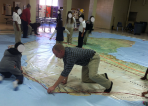 Students at Highlands Elementary School in Huntsville, Alabama using mapping tools to measure climate zones in Africa